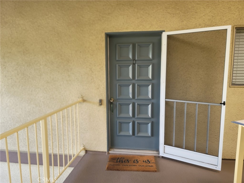 898 Ronda Sevilla, Unit O Laguna Woods, CA 92637 - Photo 1 of 1 a view of front door