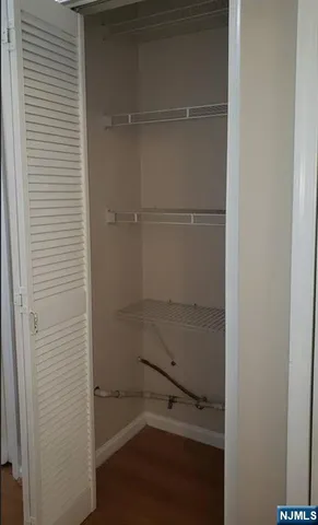 a bathroom with a close shower view