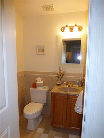 218 Rangeway Road, Unit 274 Billerica, MA 01862 - Photo 12 of 27 a bathroom with a toilet sink and mirror