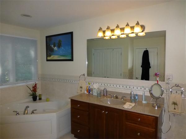 218 Rangeway Road, Unit 274 Billerica, MA 01862 - Photo 18 of 27 a bathroom with a sink and a mirror