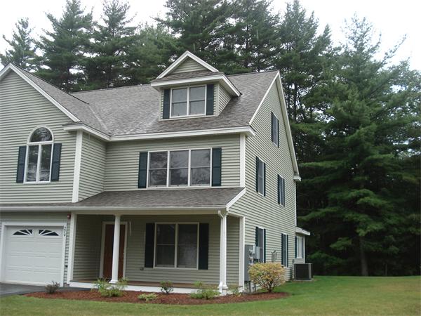 218 Rangeway Road, Unit 274 Billerica, MA 01862 - Photo 2 of 27 a front view of a house with a yard