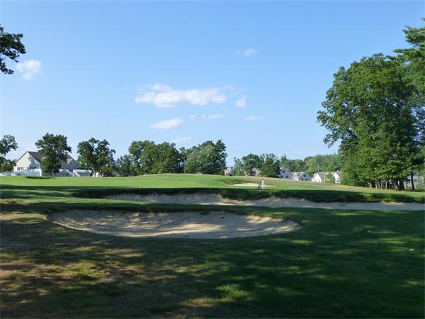 218 Rangeway Road, Unit 274 Billerica, MA 01862 - Photo 25 of 27 a view of a golf course with a lake