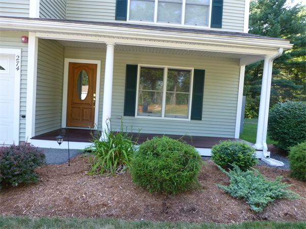218 Rangeway Road, Unit 274 Billerica, MA 01862 - Photo 4 of 27 a front view of a house with garden
