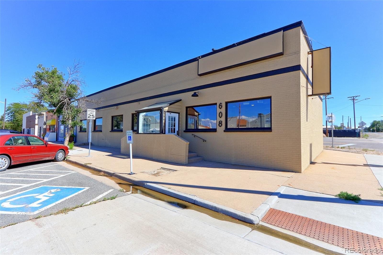 608 Cedar Street Hudson, CO 80642 - Photo 3 of 15 a view of a house with a patio