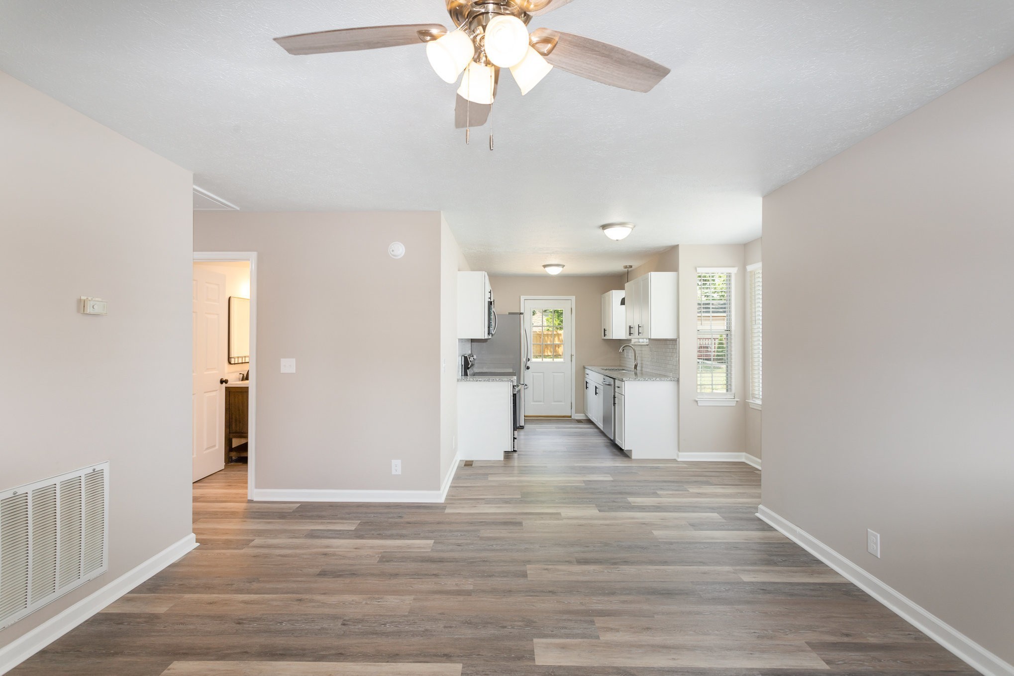 217 Maple Street Madison, TN 37115 - Photo 11 of 44 a view of a living room with wooden floor