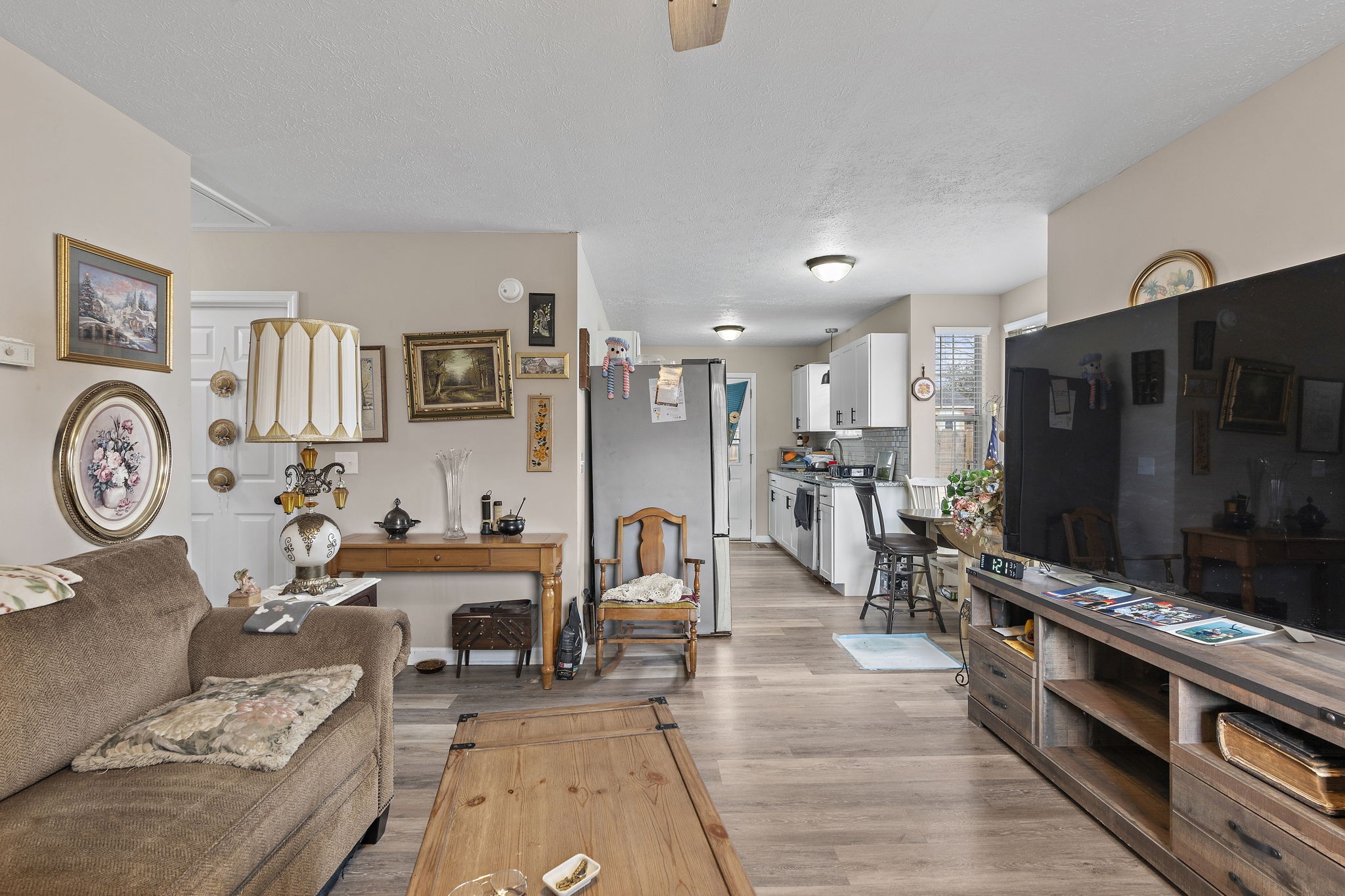 217 Maple Street Madison, TN 37115 - Photo 12 of 44 a living room with furniture and a flat screen tv