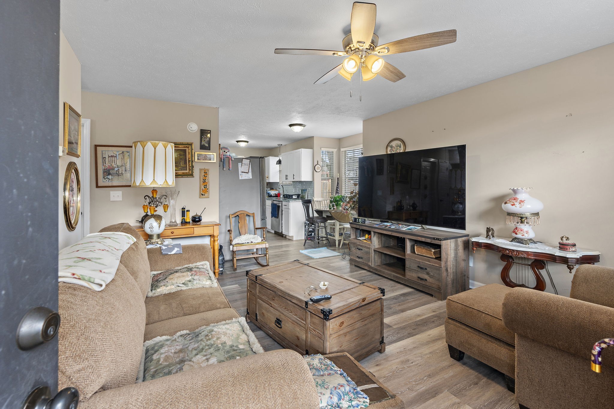 217 Maple Street Madison, TN 37115 - Photo 17 of 44 a living room with furniture and a flat screen tv