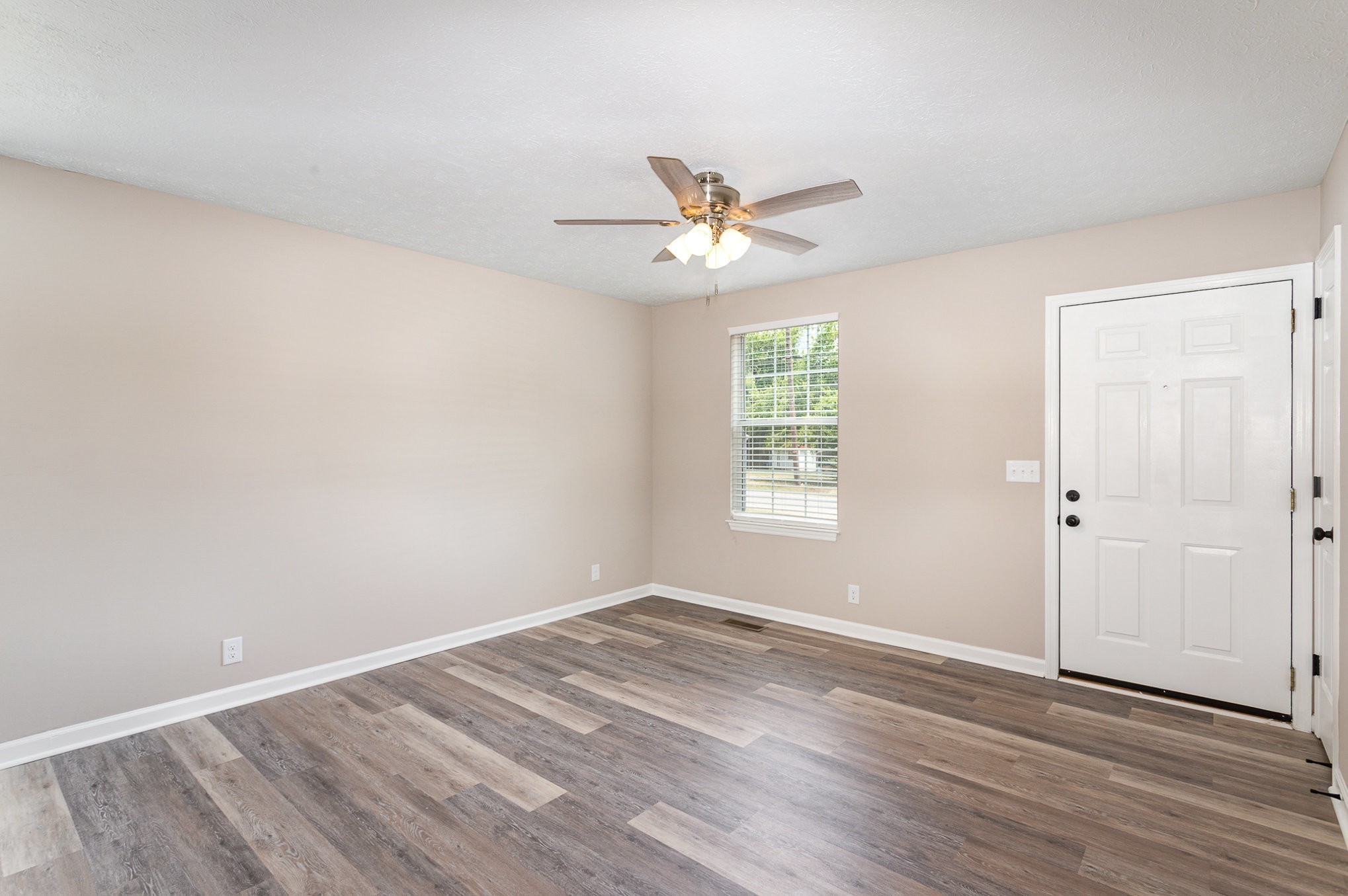 217 Maple Street Madison, TN 37115 - Photo 20 of 44 wooden floor in an empty room with a window