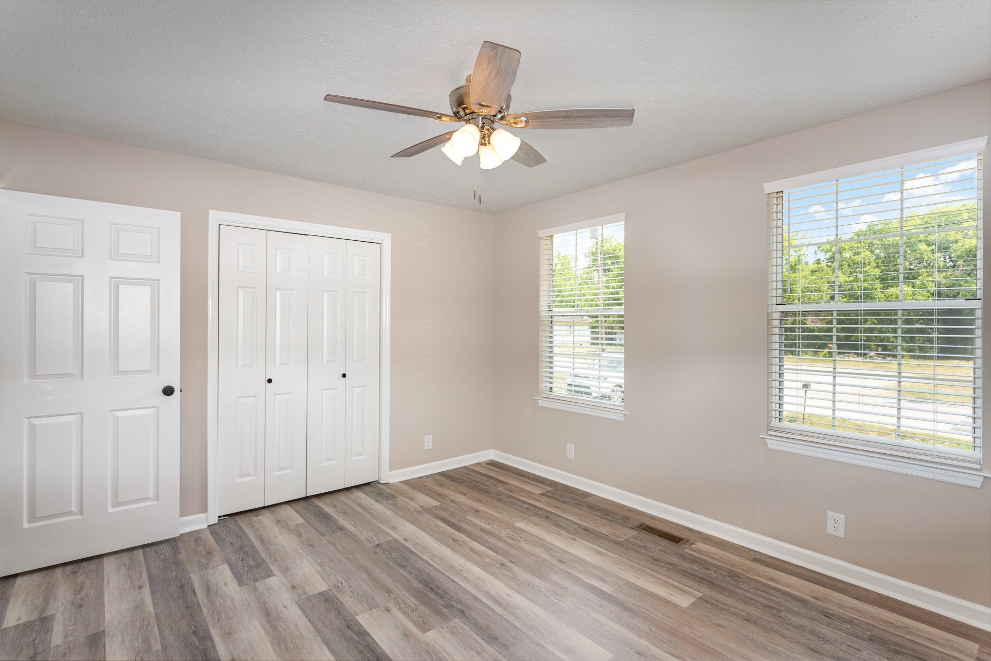 217 Maple Street Madison, TN 37115 - Photo 24 of 44 a view of an empty room with wooden floor and a window