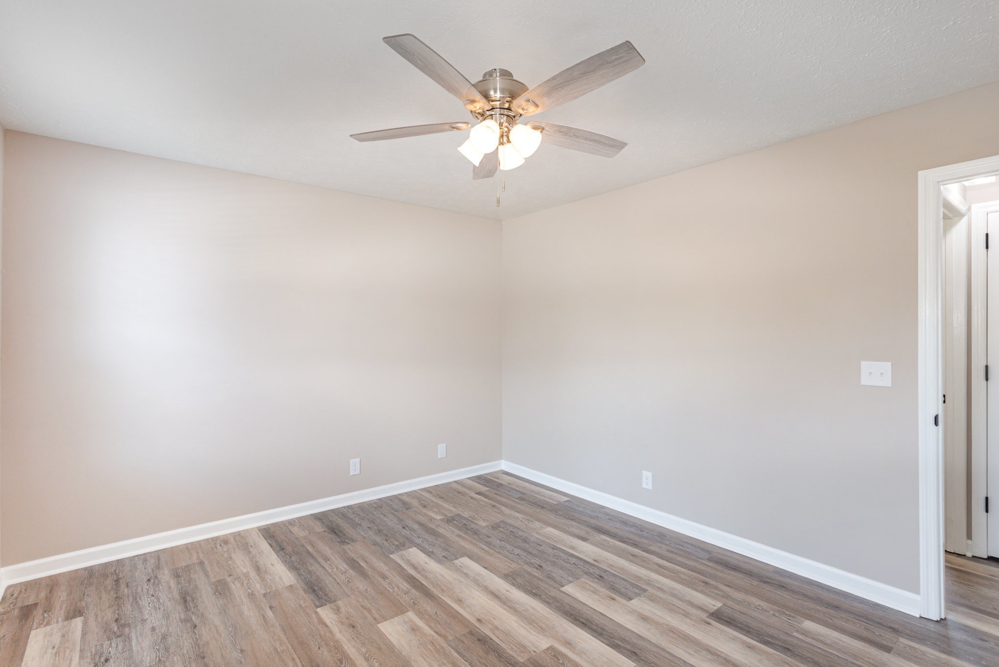 217 Maple Street Madison, TN 37115 - Photo 31 of 44 an empty room with a window and a ceiling fan