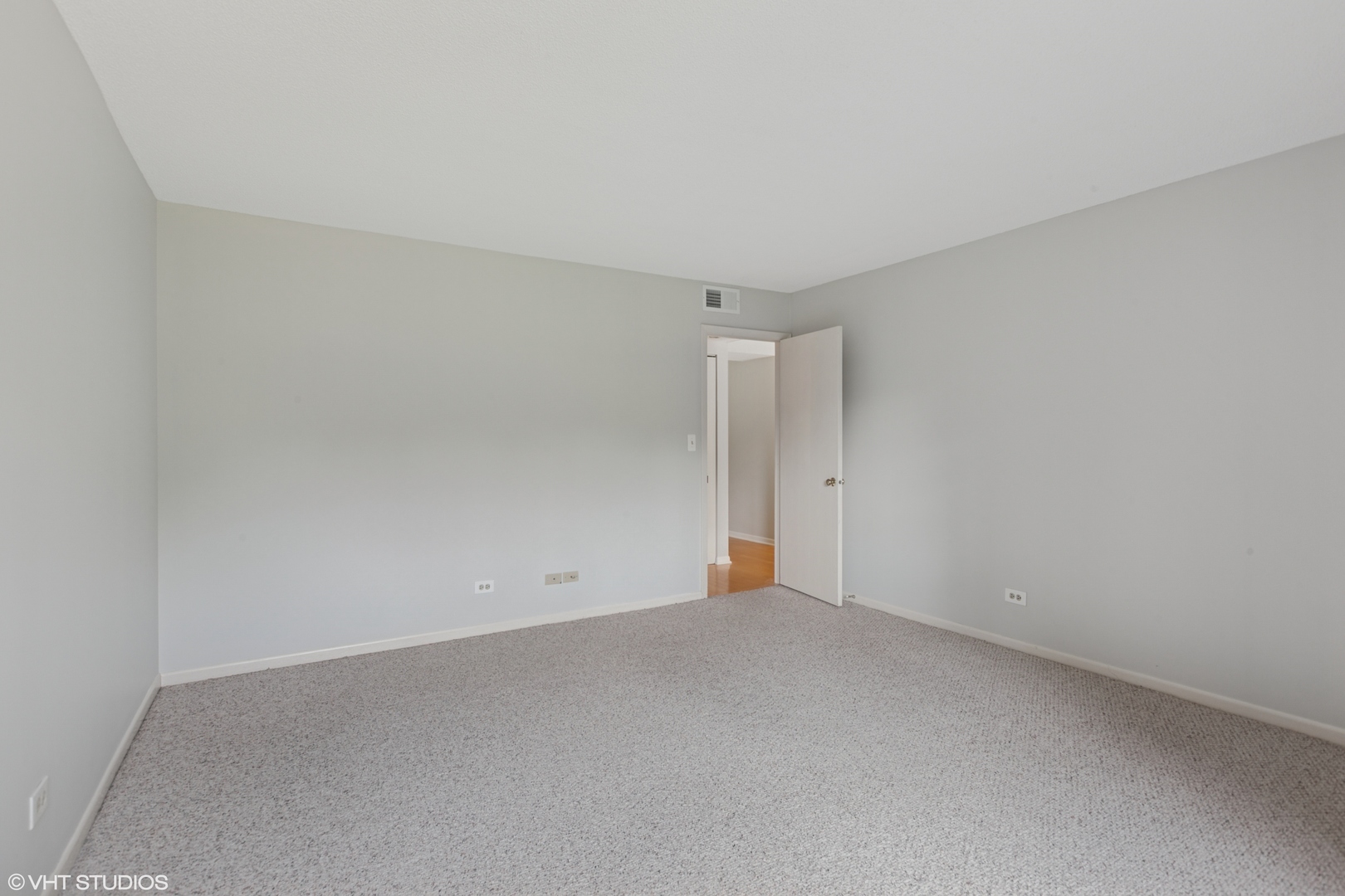 511 Aurora Avenue, Unit 108 Naperville, IL 60540 - Photo 13 of 32 a view of an empty room