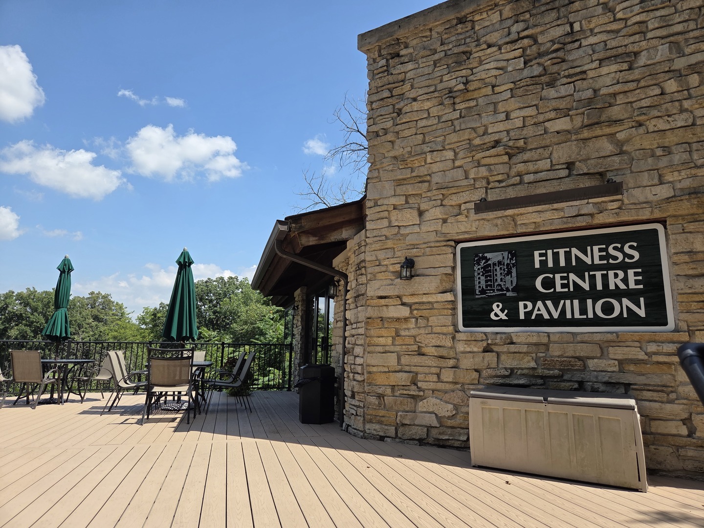 511 Aurora Avenue, Unit 108 Naperville, IL 60540 - Photo 26 of 32 a sign on the side of a building