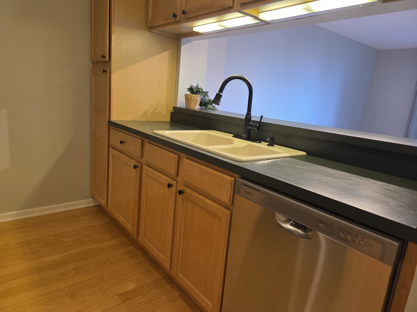 511 Aurora Avenue, Unit 108 Naperville, IL 60540 - Photo 10 of 32 a close view of sink and tap