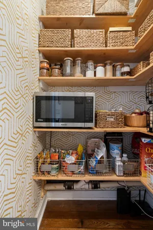 a kitchen with a stove and cabinets