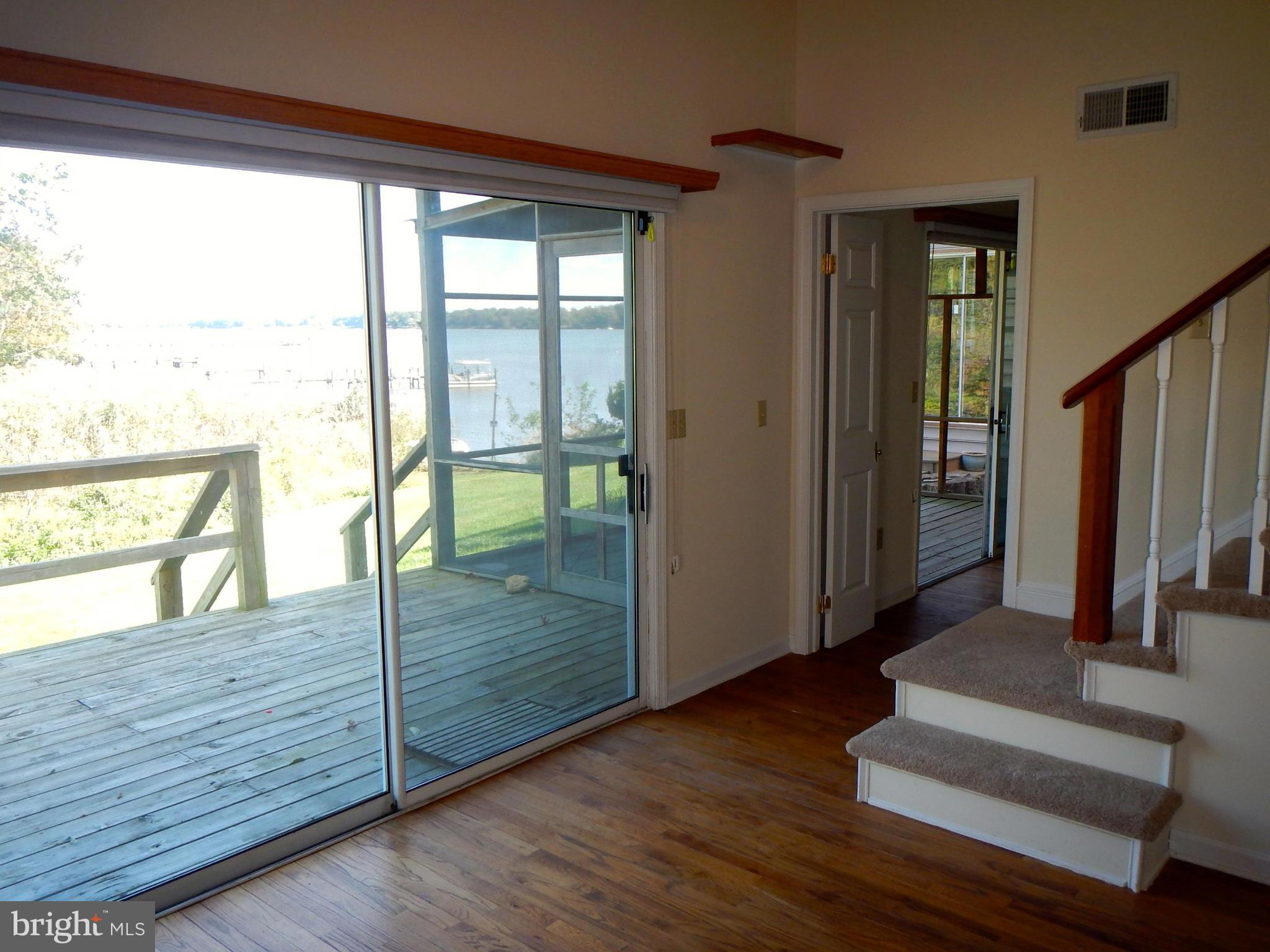 118 Riverside Terrace, Unit 8 Chestertown, MD 21620 - Photo 16 of 29 Family Room and Deck