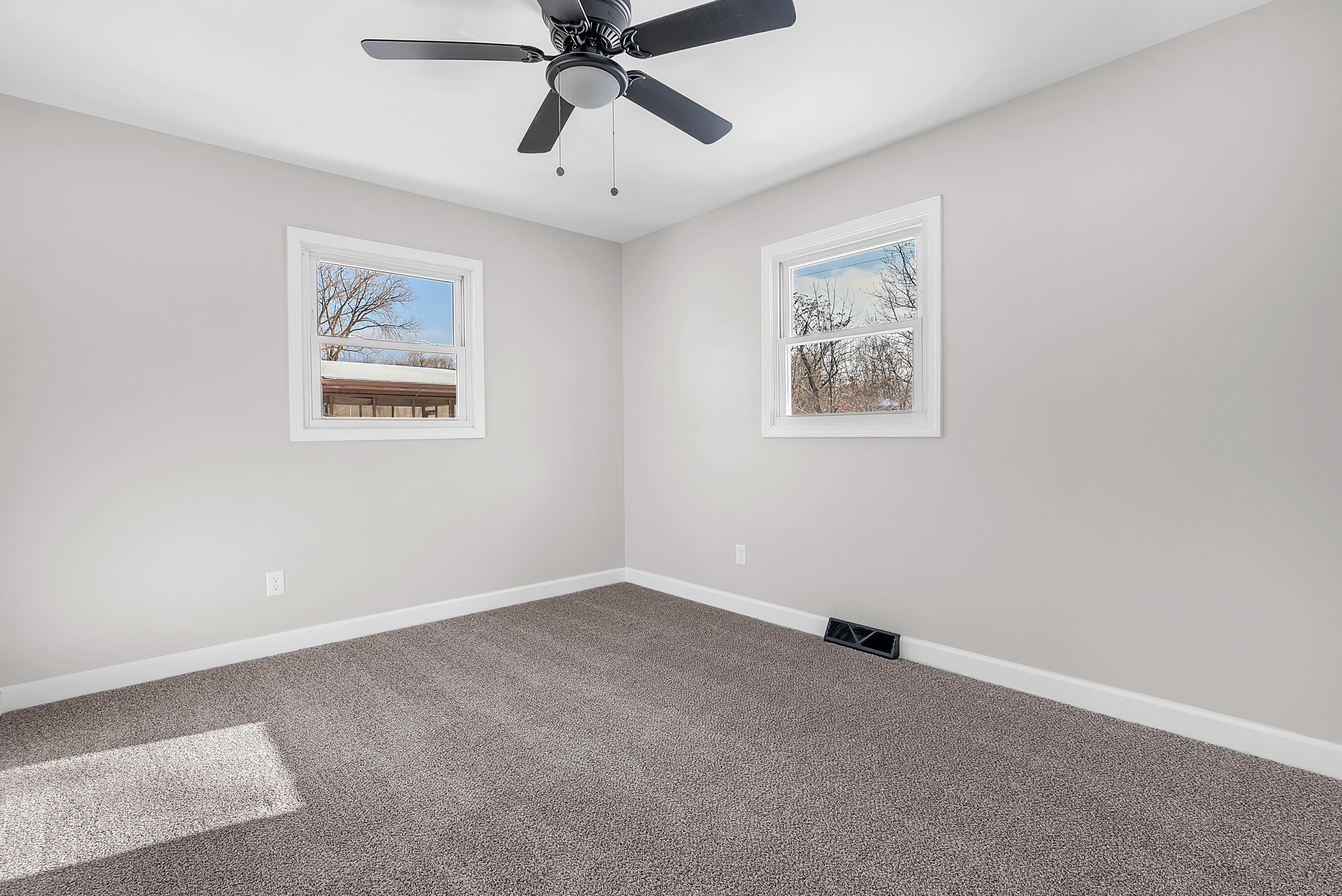 6395 Valleyview Avenue Portage, IN 46368 - Photo 11 of 20 wooden floor in a empty room with a window