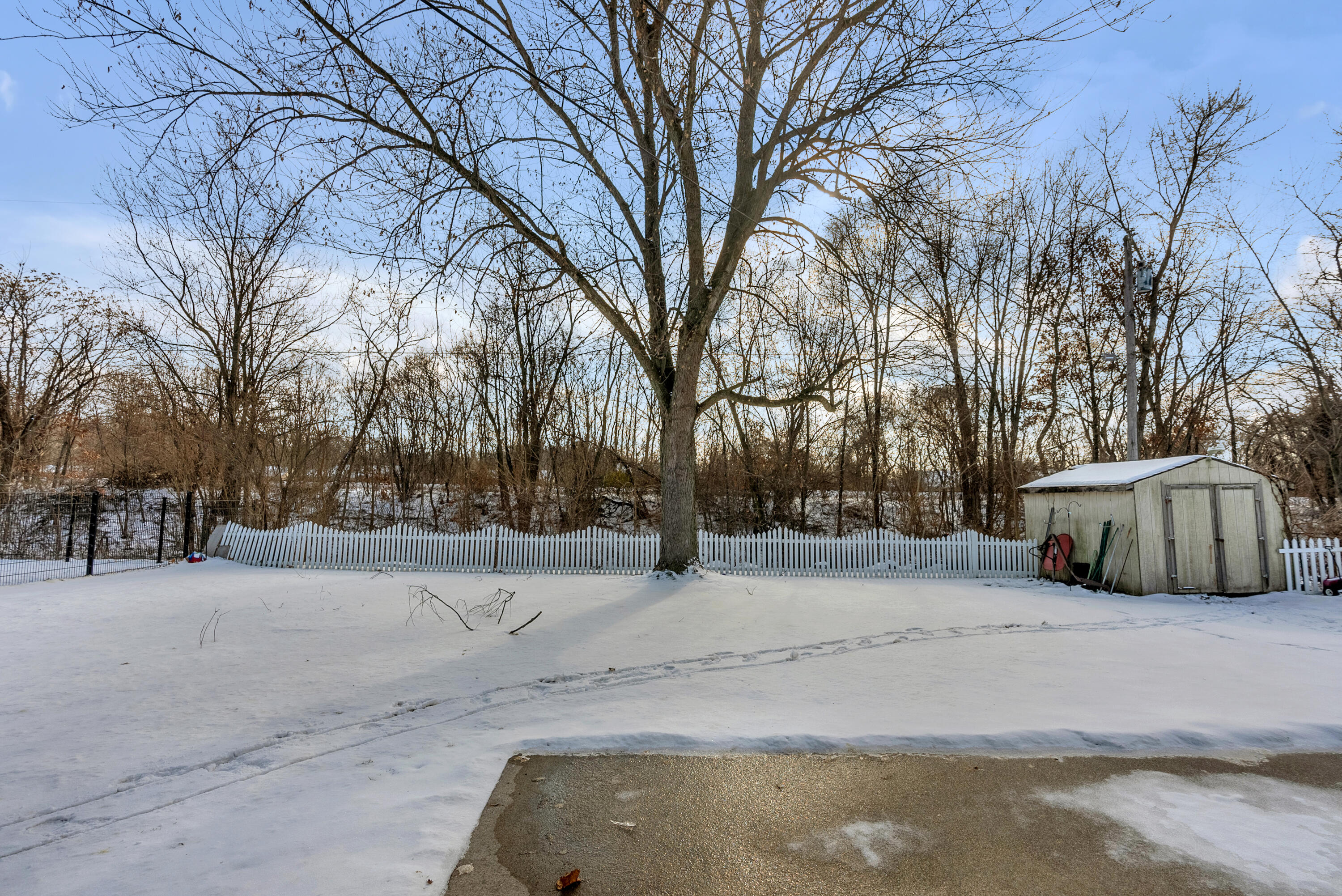 6395 Valleyview Avenue Portage, IN 46368 - Photo 20 of 20 a street view covered with snow
