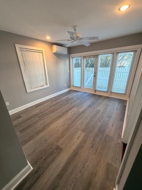 2 Nassau Lane, Unit 2 Key West, FL 33040 - Photo 12 of 12 a view of an empty room with wooden floor and a window