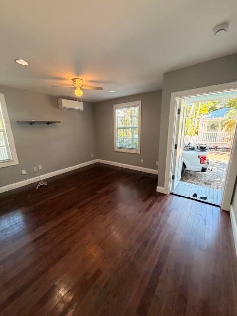 2 Nassau Lane, Unit 2 Key West, FL 33040 - Photo 5 of 12 an empty room with wooden floor and windows