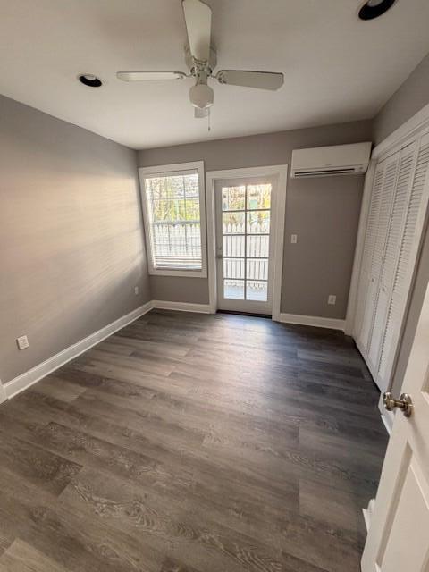 2 Nassau Lane, Unit 2 Key West, FL 33040 - Photo 10 of 12 a view of an empty room with wooden floor and a window