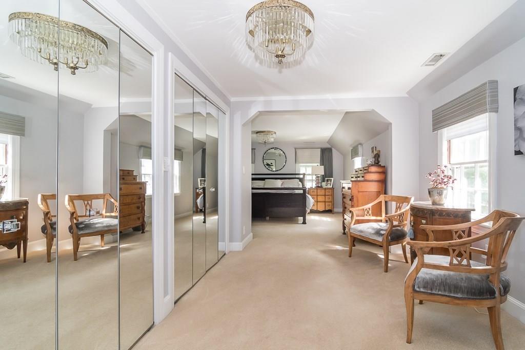 33 Tennyson Road Wellesley, MA 02481 - Photo 17 of 33 a view of a livingroom with furniture a rug a fireplace and chairs