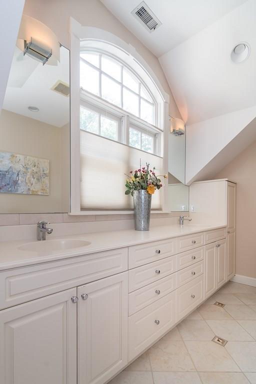 33 Tennyson Road Wellesley, MA 02481 - Photo 20 of 33 a bathroom with a granite countertop sink mirror and