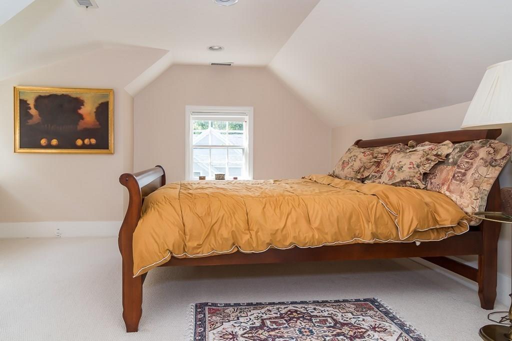 33 Tennyson Road Wellesley, MA 02481 - Photo 21 of 33 a bed sitting in a bedroom next to a window