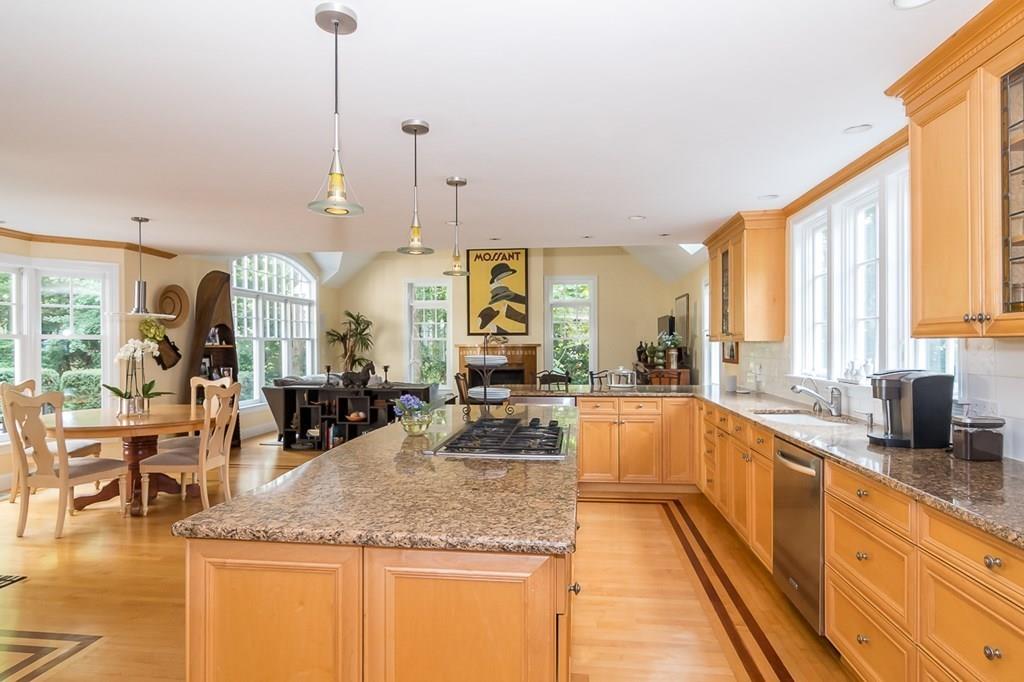 33 Tennyson Road Wellesley, MA 02481 - Photo 3 of 33 a large kitchen with granite countertop a large counter top space a sink stainless steel appliances and cabinets