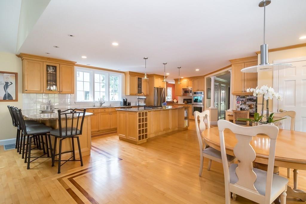 33 Tennyson Road Wellesley, MA 02481 - Photo 4 of 33 a living room with stainless steel appliances kitchen island granite countertop furniture and a dining table