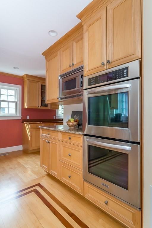 33 Tennyson Road Wellesley, MA 02481 - Photo 5 of 33 a kitchen with granite countertop white cabinets stainless steel appliances and a sink