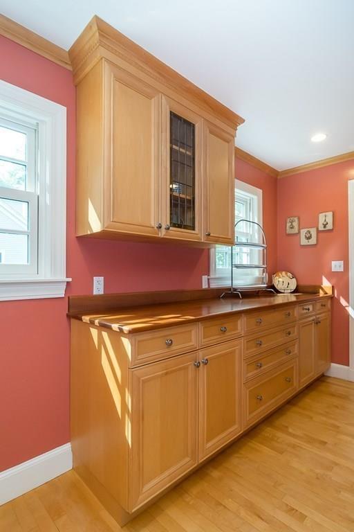 33 Tennyson Road Wellesley, MA 02481 - Photo 7 of 33 a kitchen with granite countertop cabinets and window