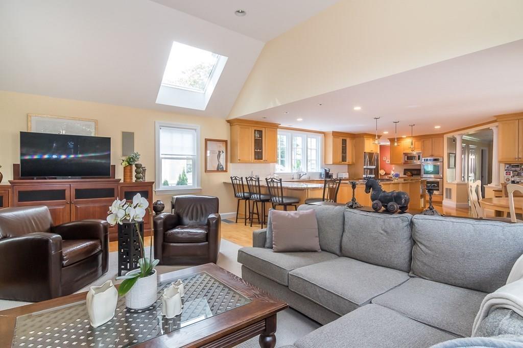 33 Tennyson Road Wellesley, MA 02481 - Photo 10 of 33 a living room with furniture kitchen view and a flat screen tv