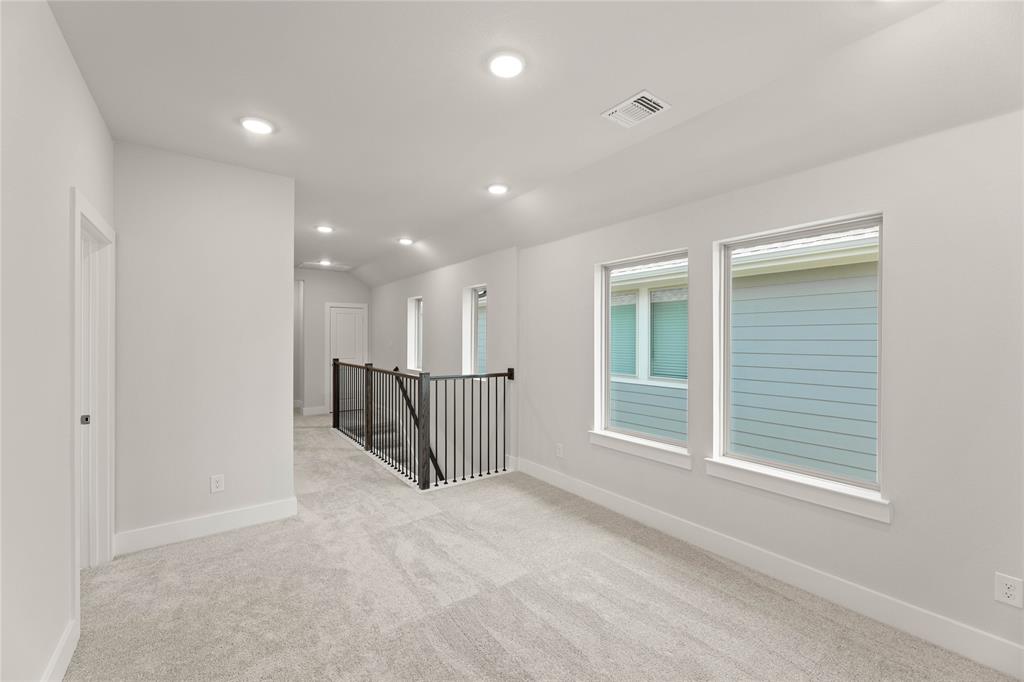 1610 Mint Road Argyle, TX 76226 - Photo 18 of 27 a view of an empty room with a window