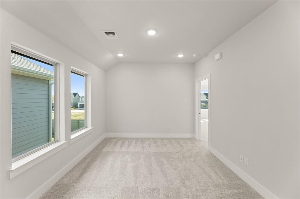 1610 Mint Road Argyle, TX 76226 - Photo 19 of 27 a view of an empty room with a window