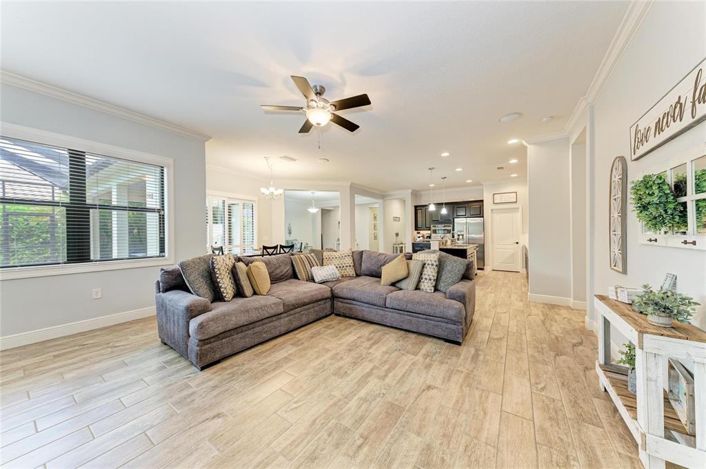 12642 Harney Street Venice, FL 34293 - Photo 20 of 85 a living room with furniture and a large window