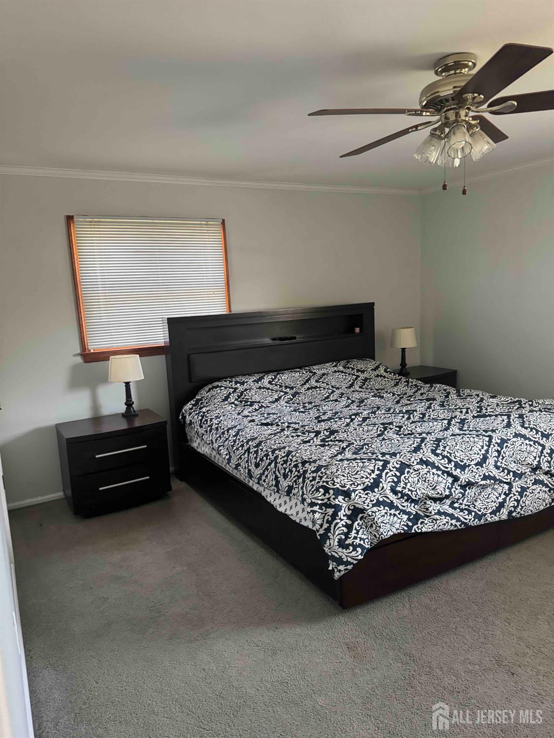 5 Timothy Court Edison, NJ 08837 - Photo 19 of 21 a bedroom with a bed and window