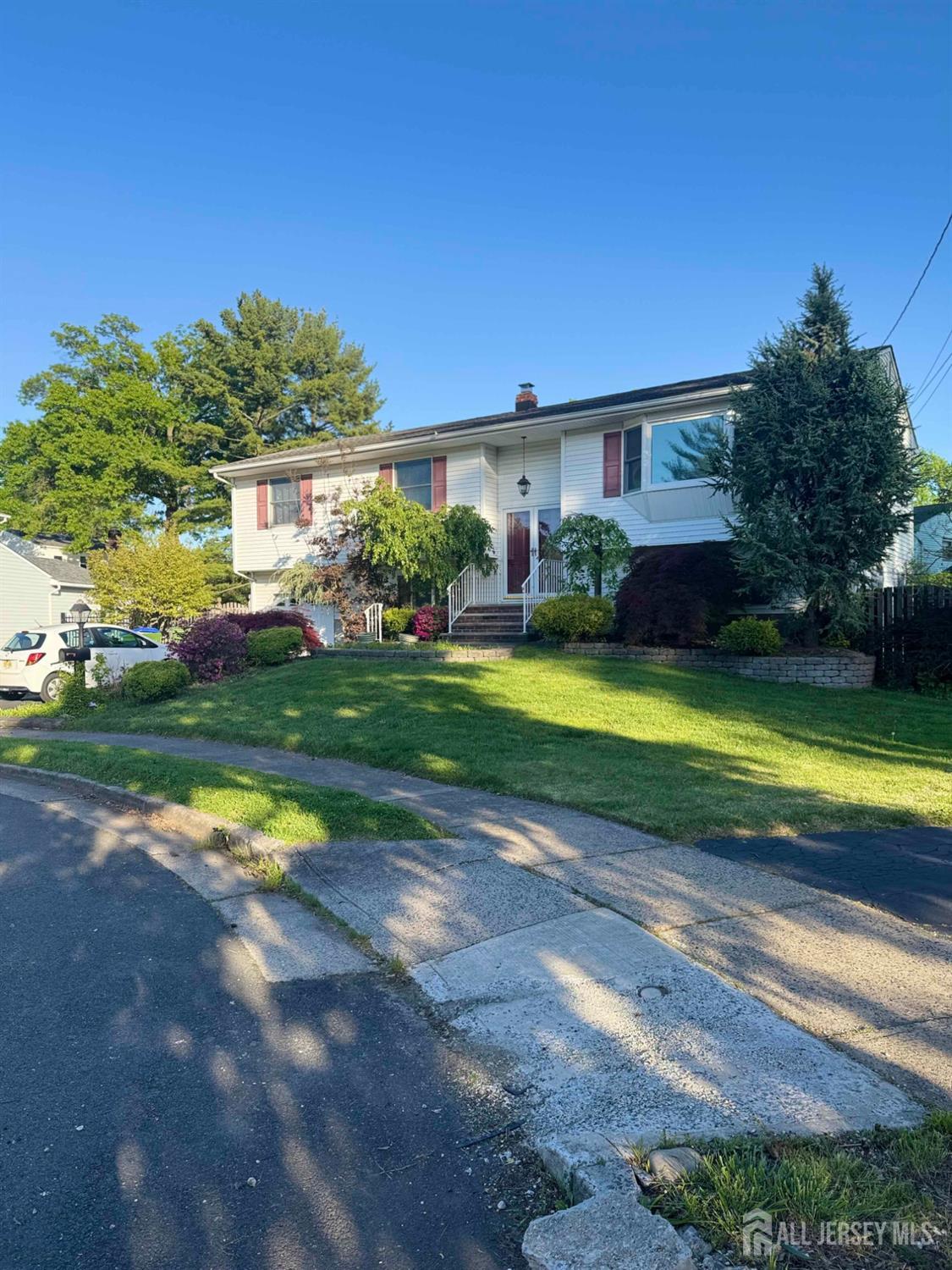 5 Timothy Court Edison, NJ 08837 - Photo 2 of 21 a view of a house with swimming pool and yard