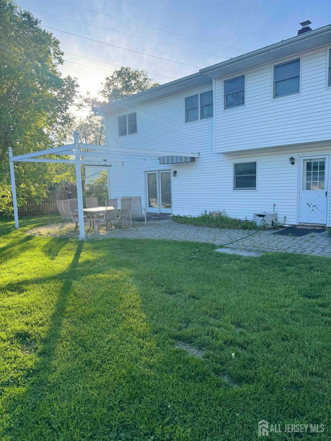 5 Timothy Court Edison, NJ 08837 - Photo 3 of 21 a house view with a garden space