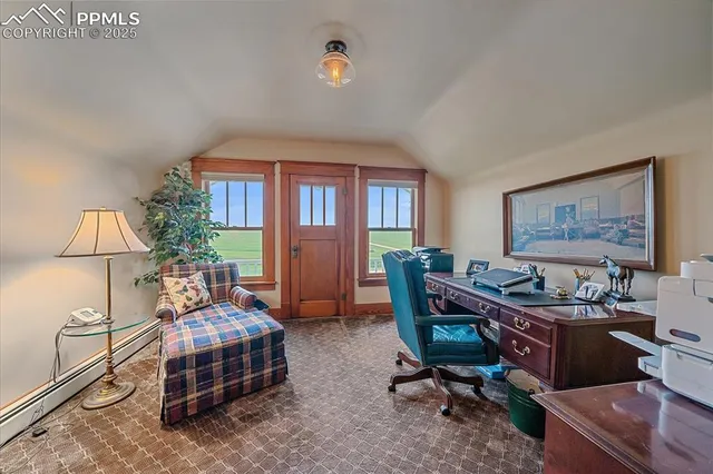 a room with furniture and a window