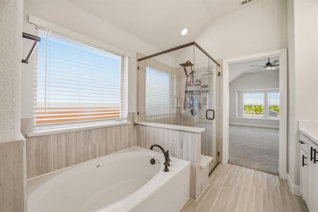 800 Jaguar Ridge Godley, TX 76044 - Photo 10 of 23 a bathroom with a bathtub and shower
