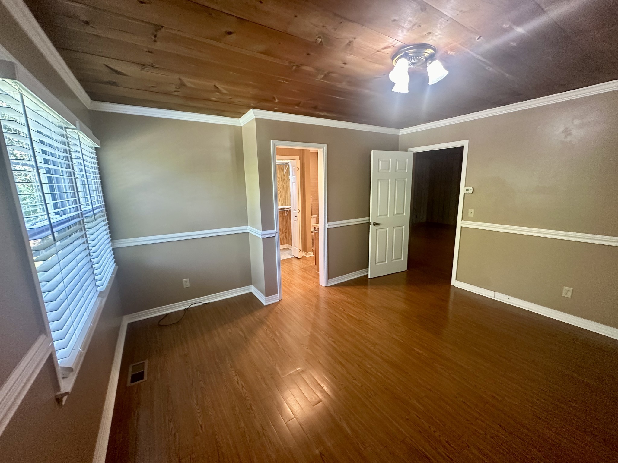 61 Nelson Road Lawrenceburg, TN 38464 - Photo 20 of 55 a view of empty room with wooden floor and fan