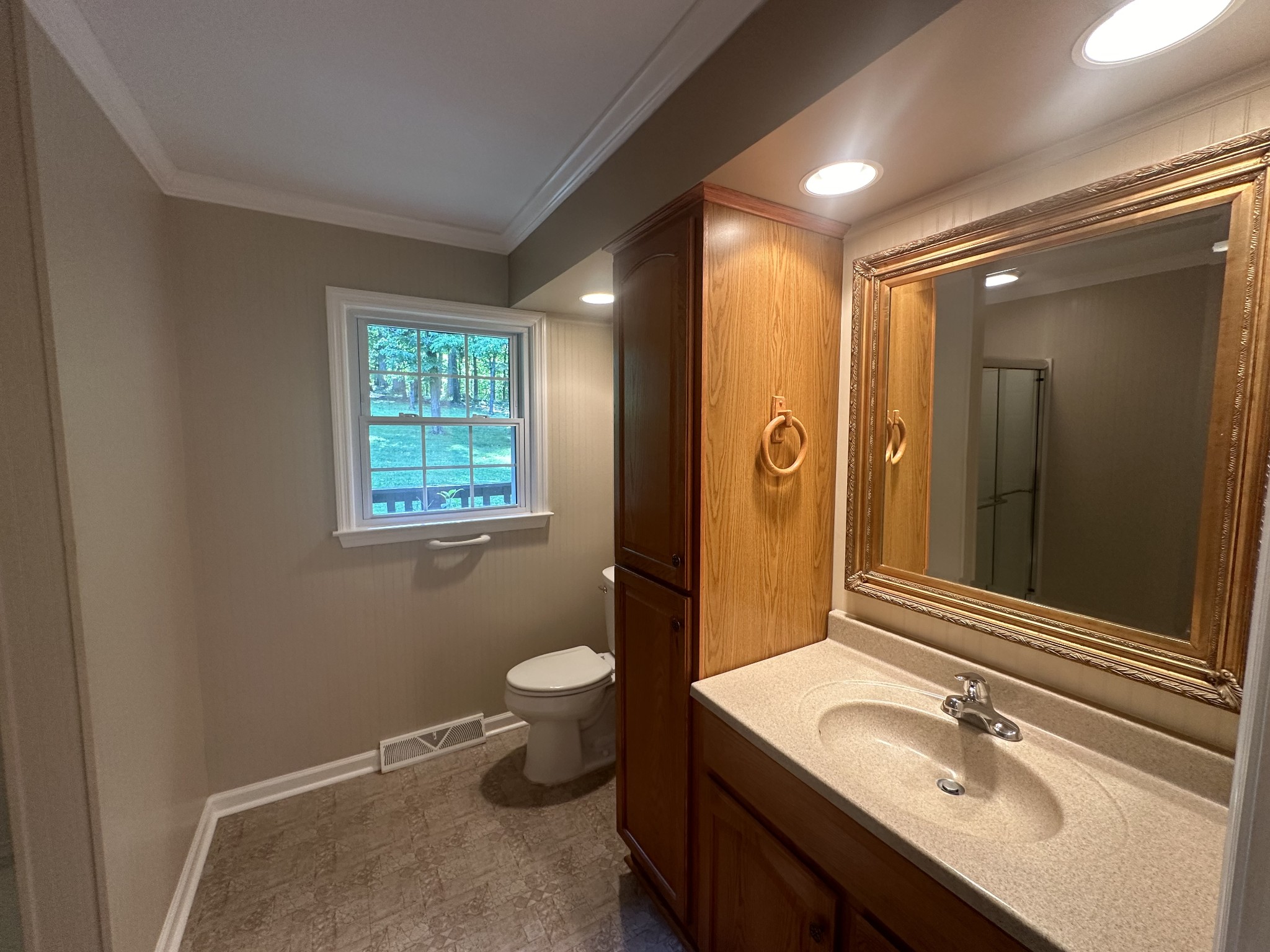 61 Nelson Road Lawrenceburg, TN 38464 - Photo 29 of 55 a bathroom with a granite countertop sink toilet and shower
