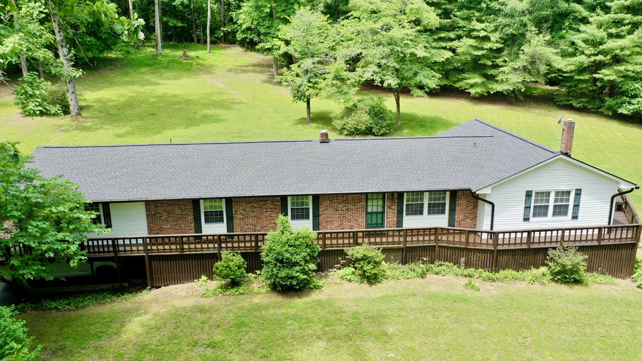 61 Nelson Road Lawrenceburg, TN 38464 - Photo 4 of 55 a aerial view of a house with swimming pool and a yard