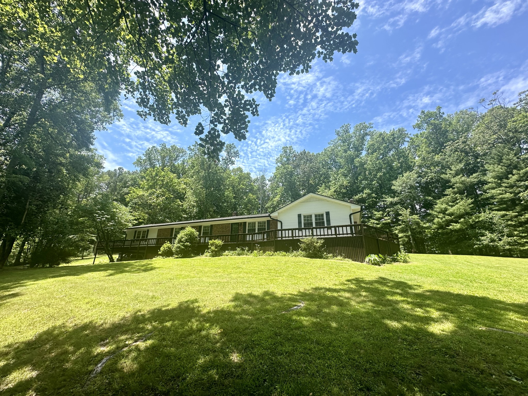 61 Nelson Road Lawrenceburg, TN 38464 - Photo 7 of 55 a swimming pool with outdoor seating and yard
