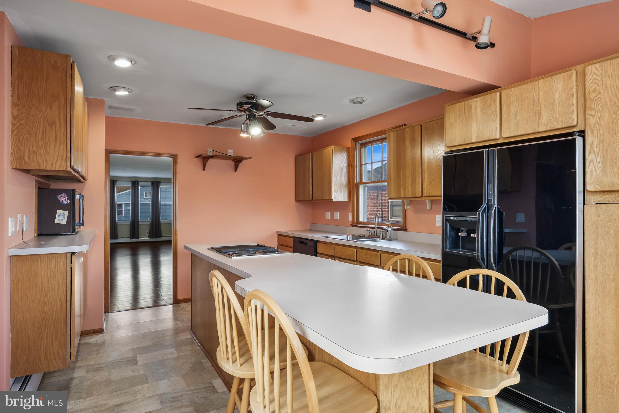 19 South Chestnut Avenue Maple Shade, NJ 08052 - Photo 13 of 31 a kitchen with stainless steel appliances granite countertop a sink a stove and a refrigerator