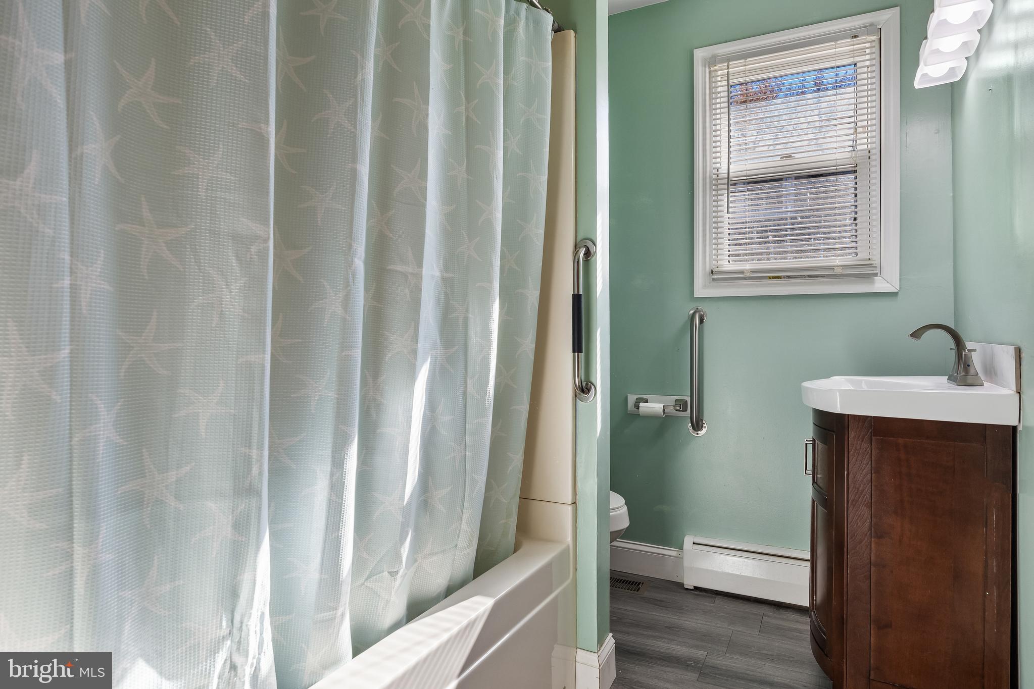 19 South Chestnut Avenue Maple Shade, NJ 08052 - Photo 15 of 31 a bathroom with a sink and toilet