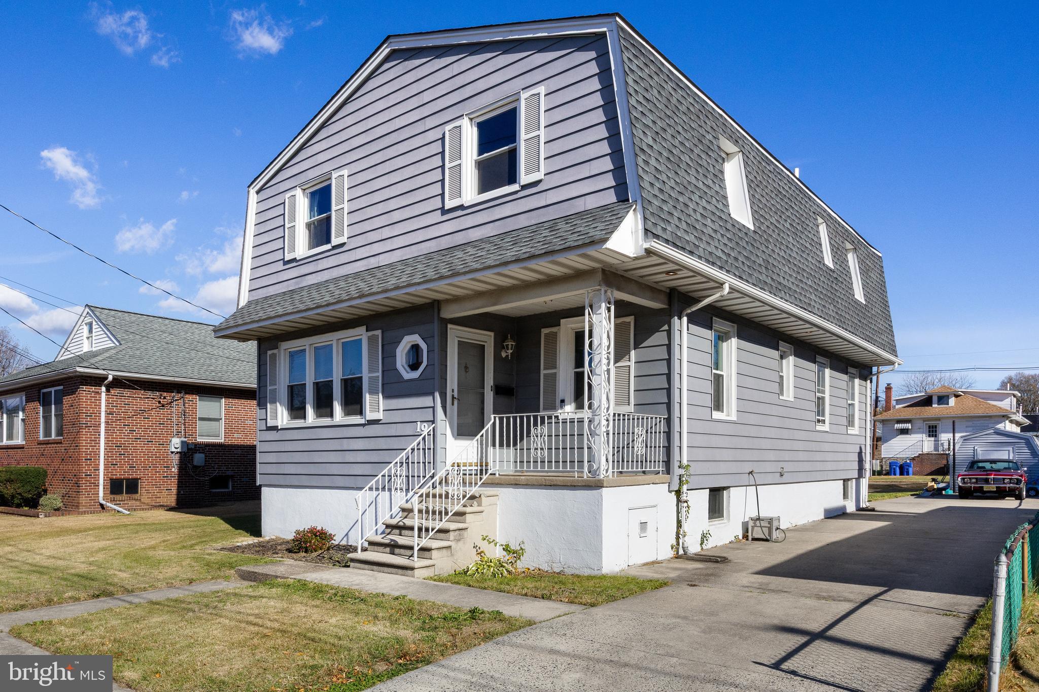 19 South Chestnut Avenue Maple Shade, NJ 08052 - Photo 2 of 31 a front view of a house with a yard