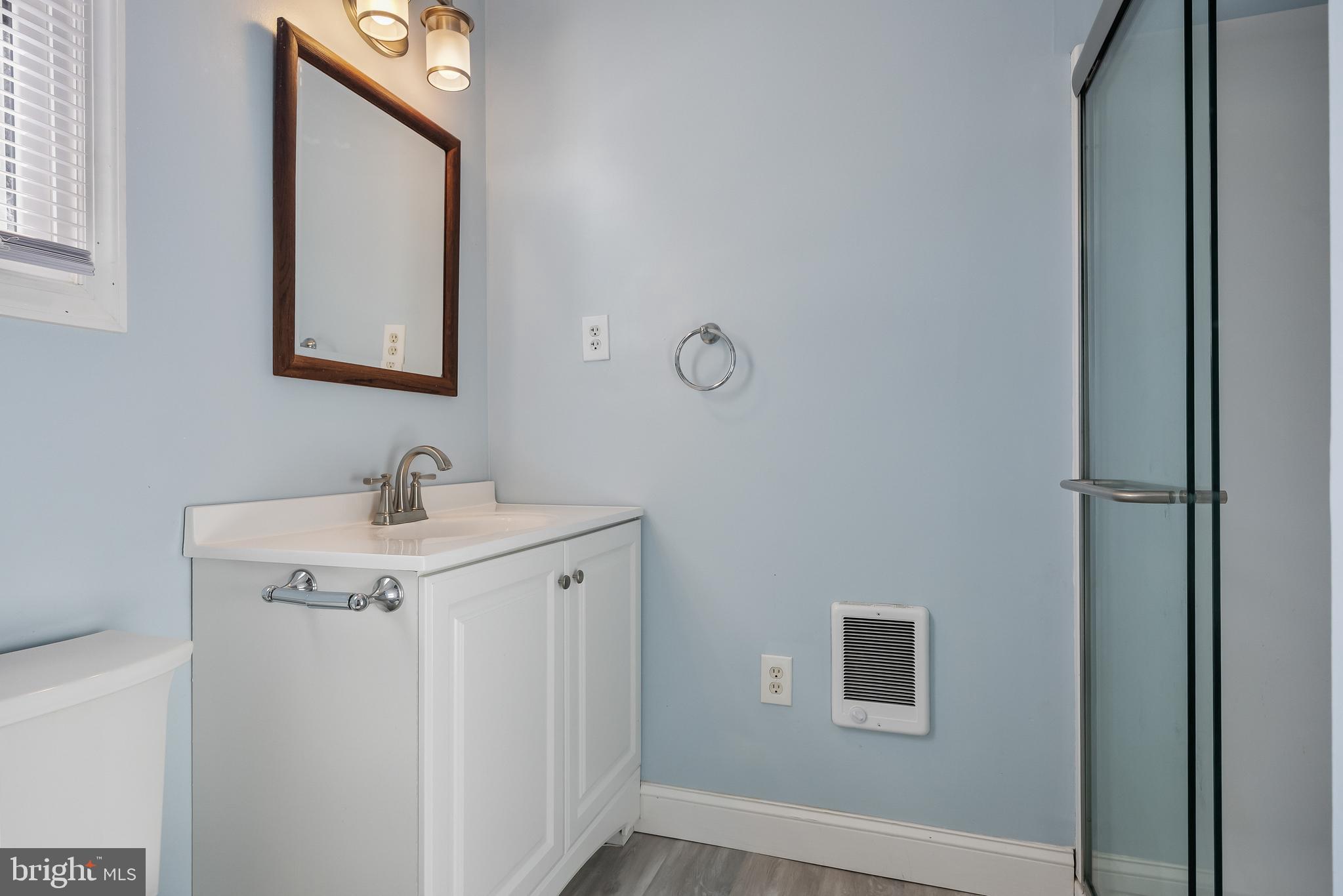 19 South Chestnut Avenue Maple Shade, NJ 08052 - Photo 21 of 31 a bathroom with a sink and a mirror