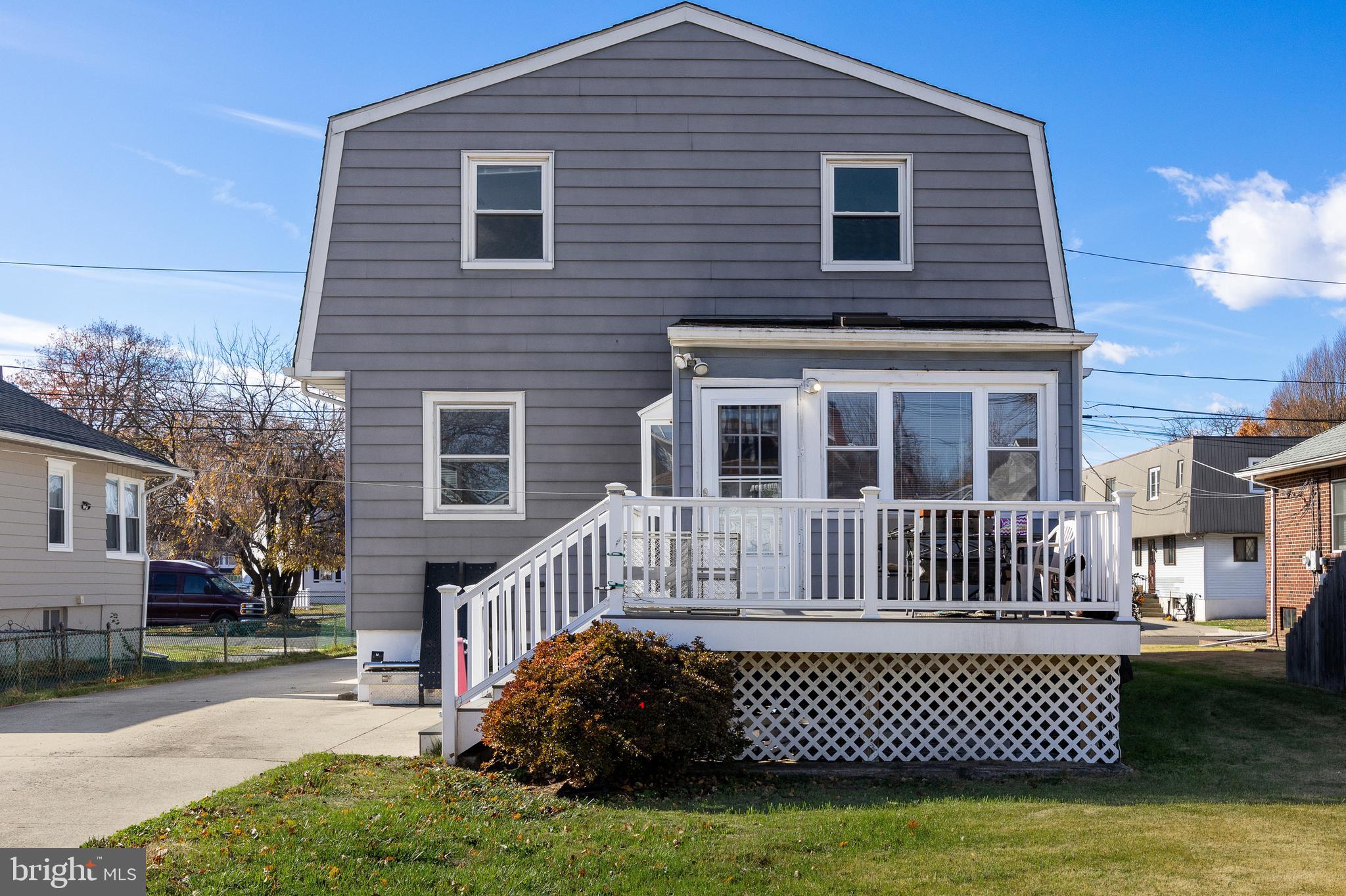 19 South Chestnut Avenue Maple Shade, NJ 08052 - Photo 24 of 31 a front view of a house with a garden