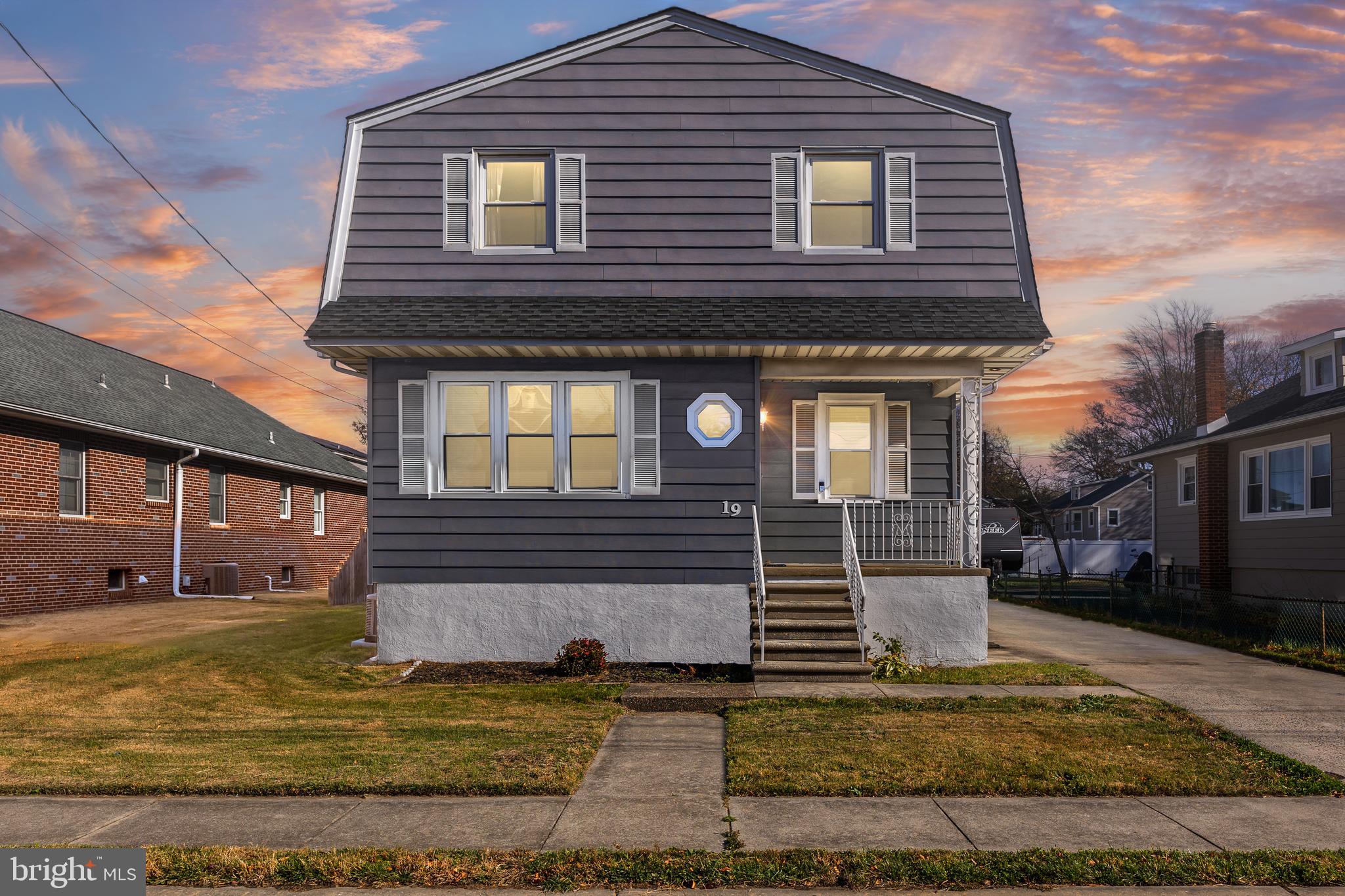 19 South Chestnut Avenue Maple Shade, NJ 08052 - Photo 27 of 31 a front view of a house with a yard